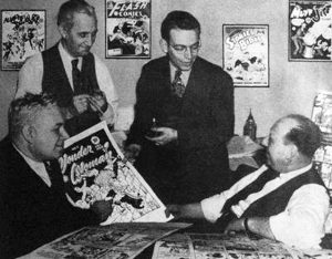 THE SECRET HISTORY OF WONDER WOMAN DC Comics editorial meeting 1942 with William Moulton Marston. artistHarry G Peter editor Sheldon Mayer publisher MC Gaines Publicity photo