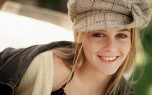 alicia silverstone wearing hat smiling cutely 1920x1200