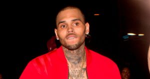 Chris Brown shirtless with just an open jacket seen leaving Argyle Night Club in Hollywood CA