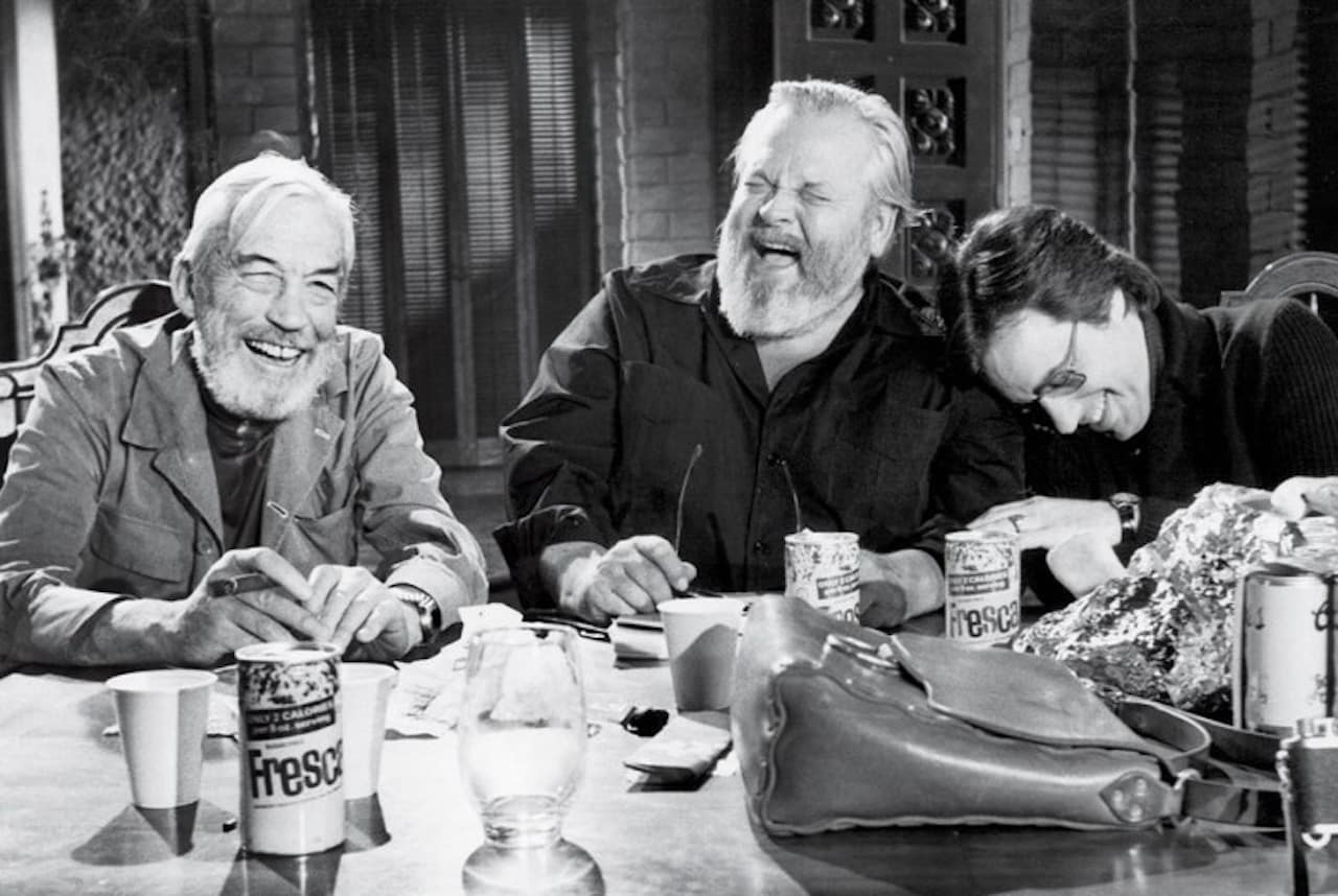 Huston, Welles e Bogdanovich sul set del film.